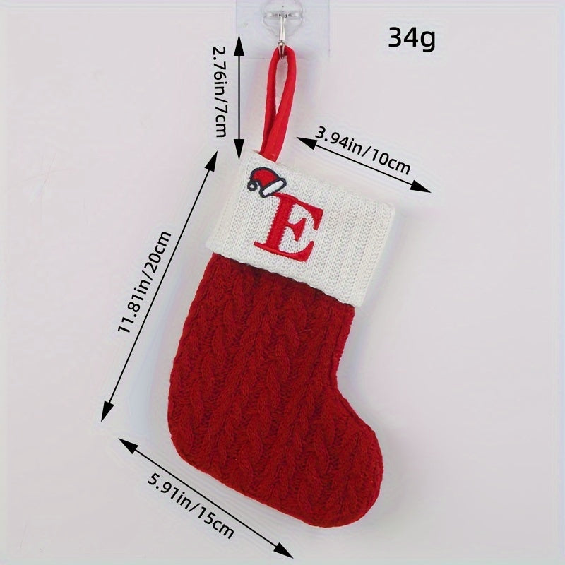 Knitted letter Christmas socks for home tree ornaments; red socks in gift bag for festive attire.