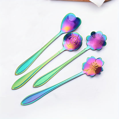 Four stainless steel cherry blossom coffee/dessert spoons.