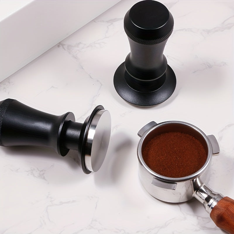 Coffee Tamper with 51/53/58mm Calibrated Size and Spring Loaded Design, Featuring Flat Stainless Steel Base in Black and Silvery Colors. Includes Two Springs for Firm and Even Tamping.