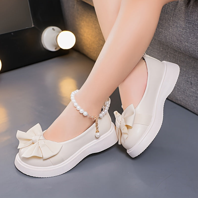 Stylish Mary Jane flats for girls feature pearl and bow accents, perfect for parties and casual wear in spring and fall.