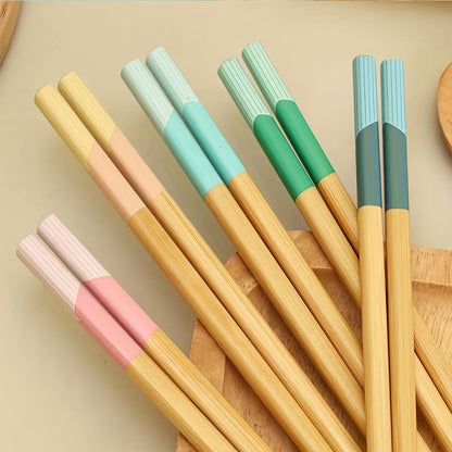 5 pairs of bamboo chopsticks that are antibacterial, anti-mold, anti-slip, carbonized, and high-temperature resistant. They are also reusable, lightweight, dishwasher safe kitchen supplies.