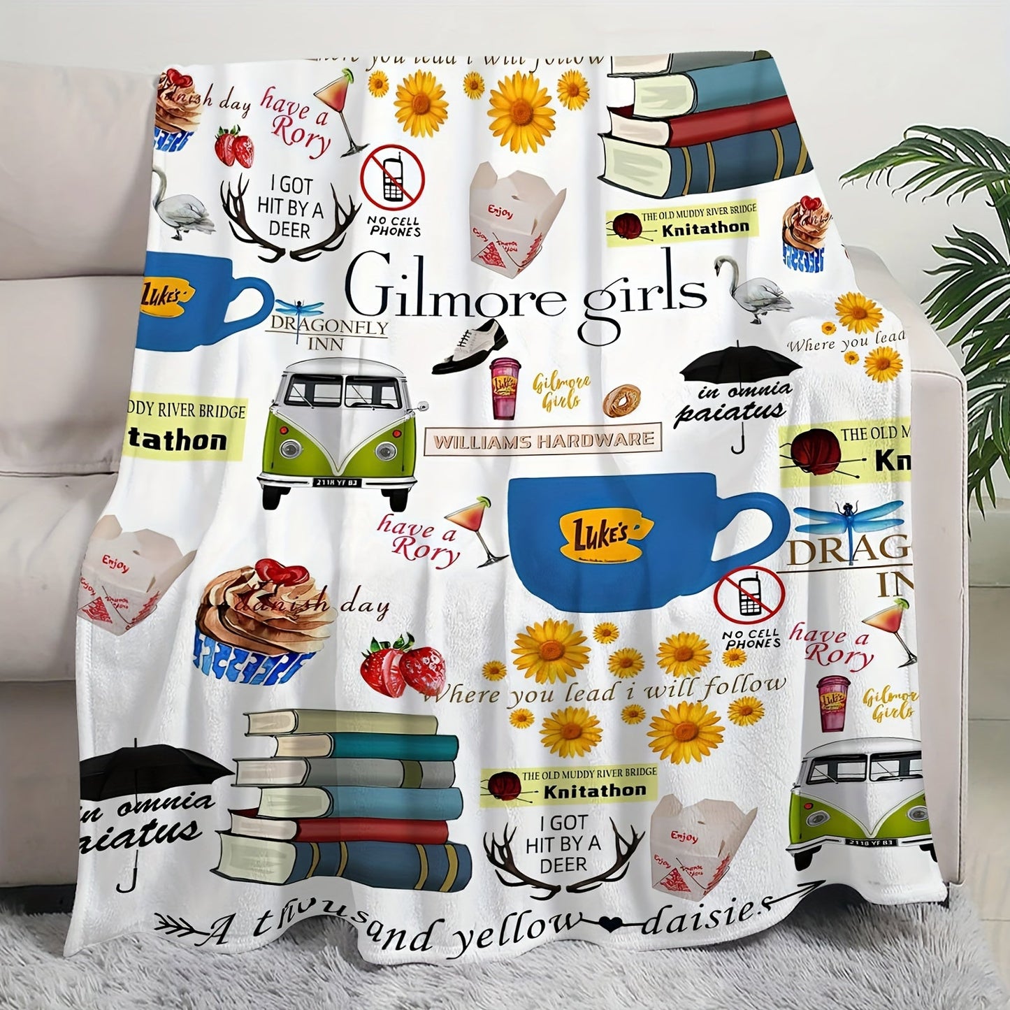 Soft and reversible flannel throw blanket inspired by Gilmore Girls, perfect for cozying up on the couch, bed, or in the office - a great birthday gift for foodies and fans of the show.