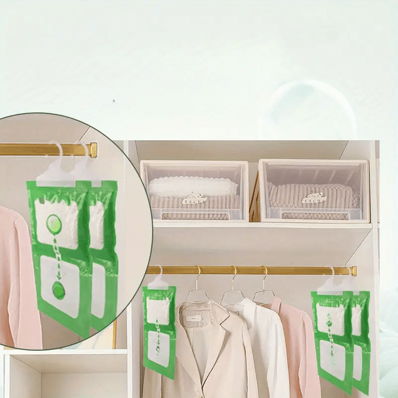 4 Green Hanging Wardrobe Dehumidifier Bags with Transparent Window, Non-Toxic Odor Eliminator for Closet, Portable & Battery-Free, Ideal for Home Use.