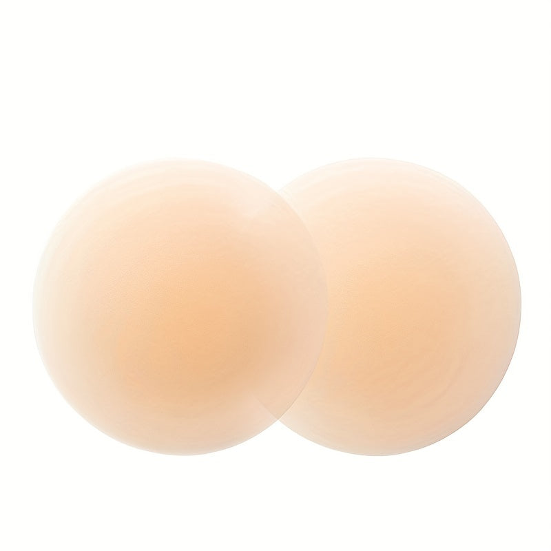 Reusable stick-on nipple covers made of invisible silicone to lift and support. Ideal for lingerie and underwear.