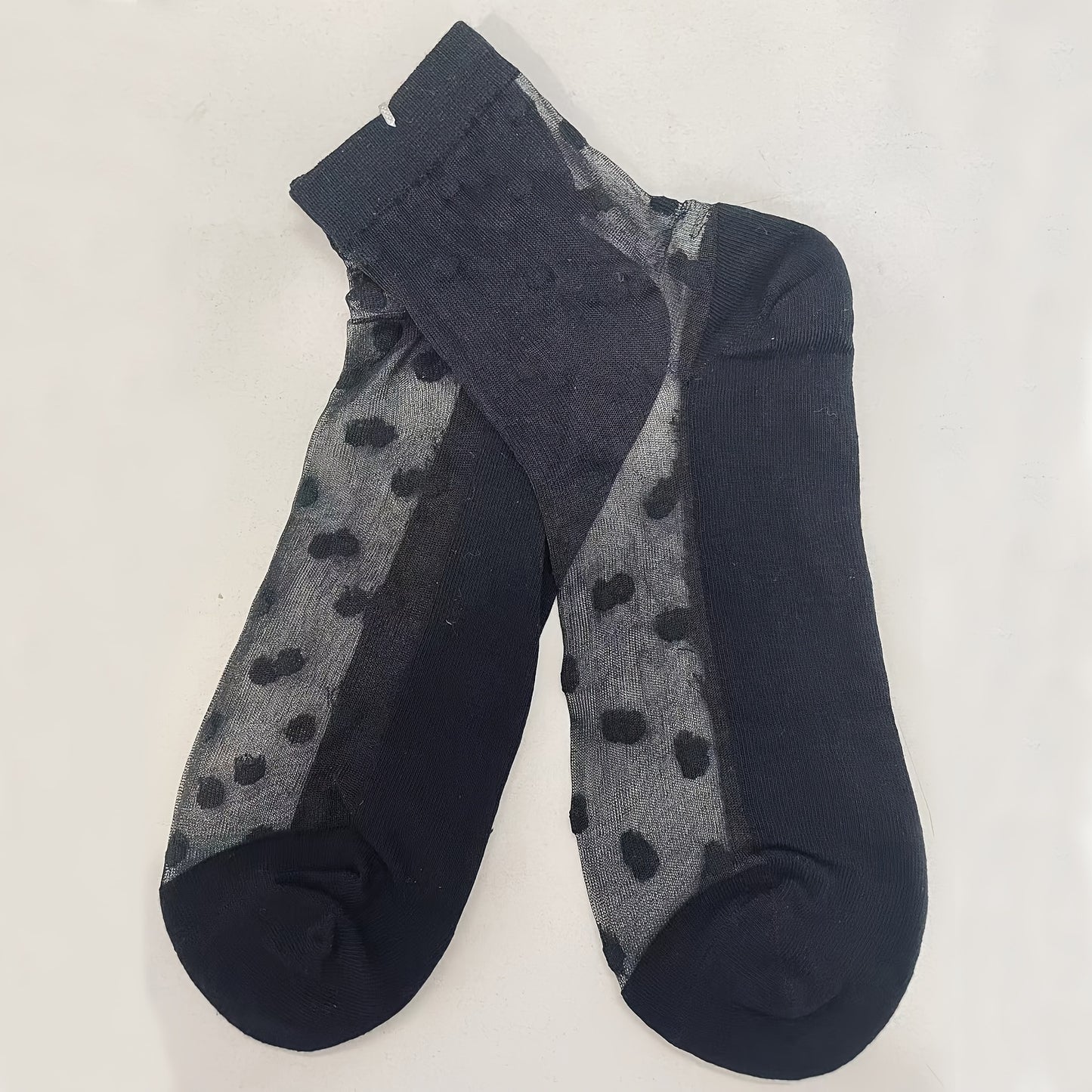 Stylish polka dot sheer socks for women, hand-washable and mid-calf length, perfect for cute outfits.