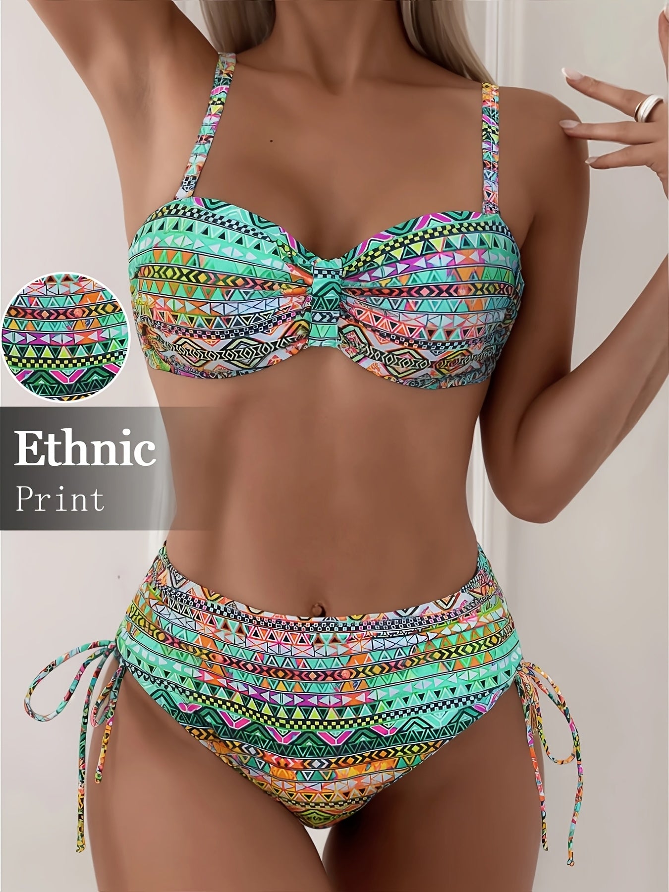 Two-piece set featuring vibrant printed pants with drawstring design and matching swimsuit.