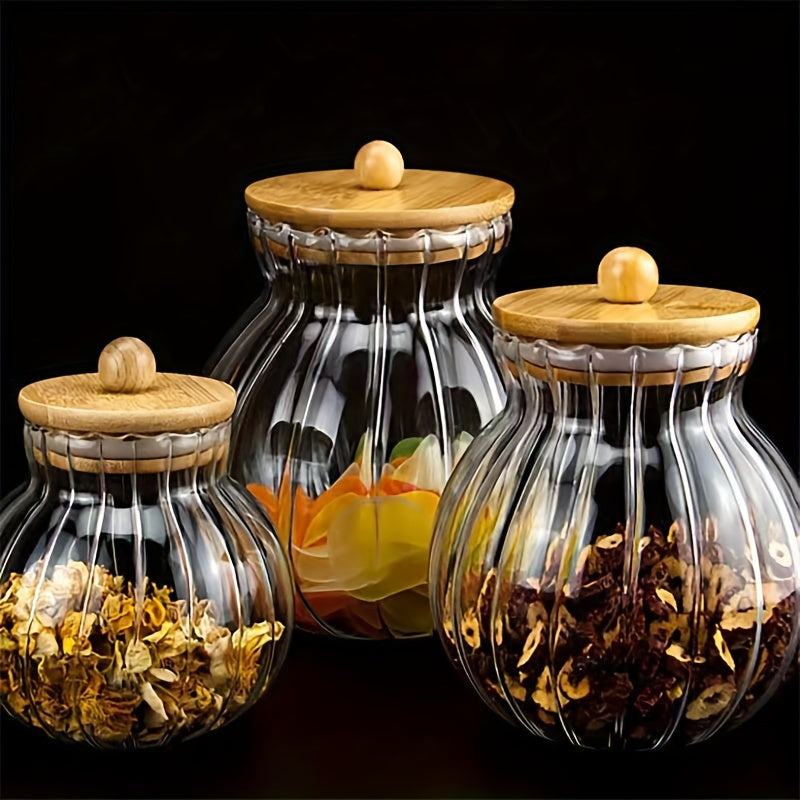 Glass storage jar with bamboo lid featuring stripes - perfect for storing tea, snacks, seasonings, and candy in the kitchen or dining room. Can be used multiple times.