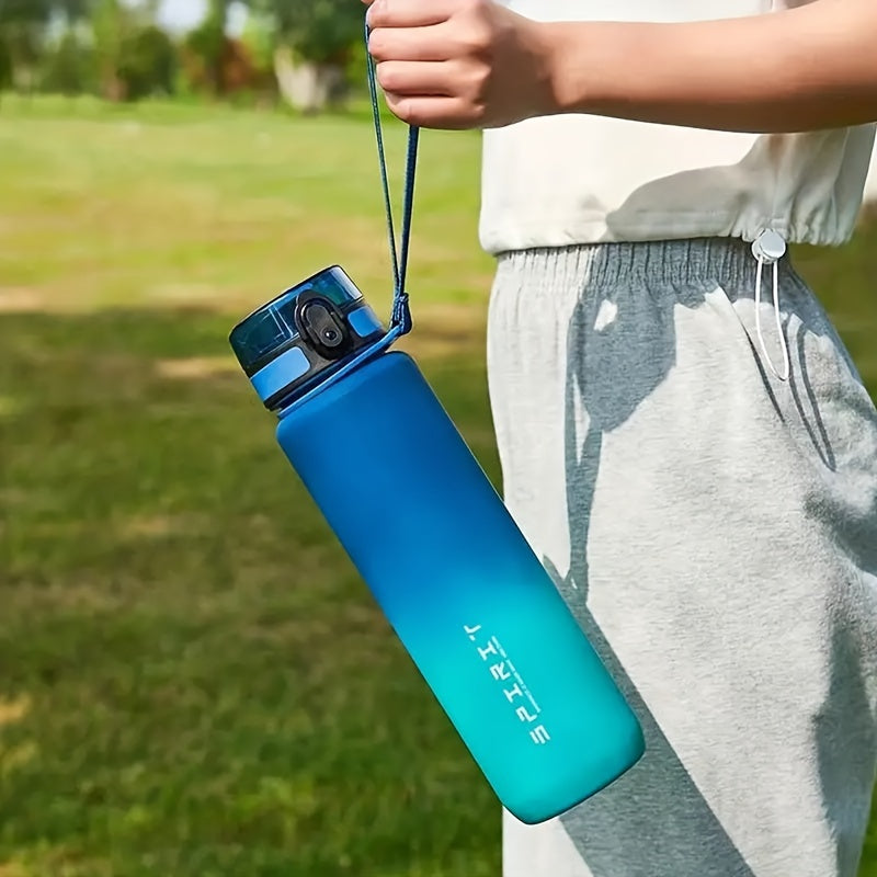 Leakproof water bottle with time marker and carrying strap.