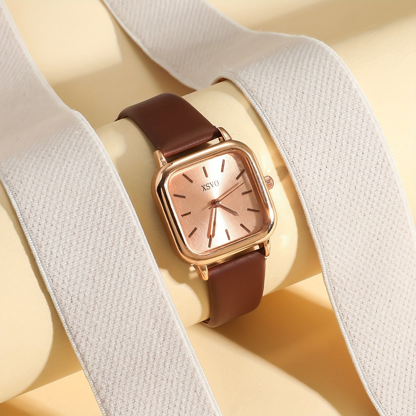 Women's casual square wrist watch with quartz movement, zinc alloy case, PU leather strap, electronic drive, and non-rechargeable button battery - a fashionable accessory for daily wear.