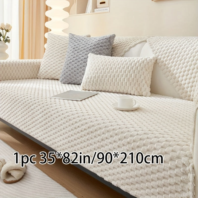 Non-slip sofa cover with honeycomb pattern, ideal for all seasons and protecting furniture in any room.