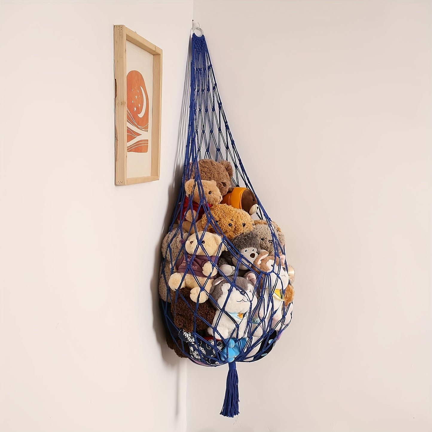 Plush toy storage hammock for kids' rooms, easy to install, holds multiple toys.