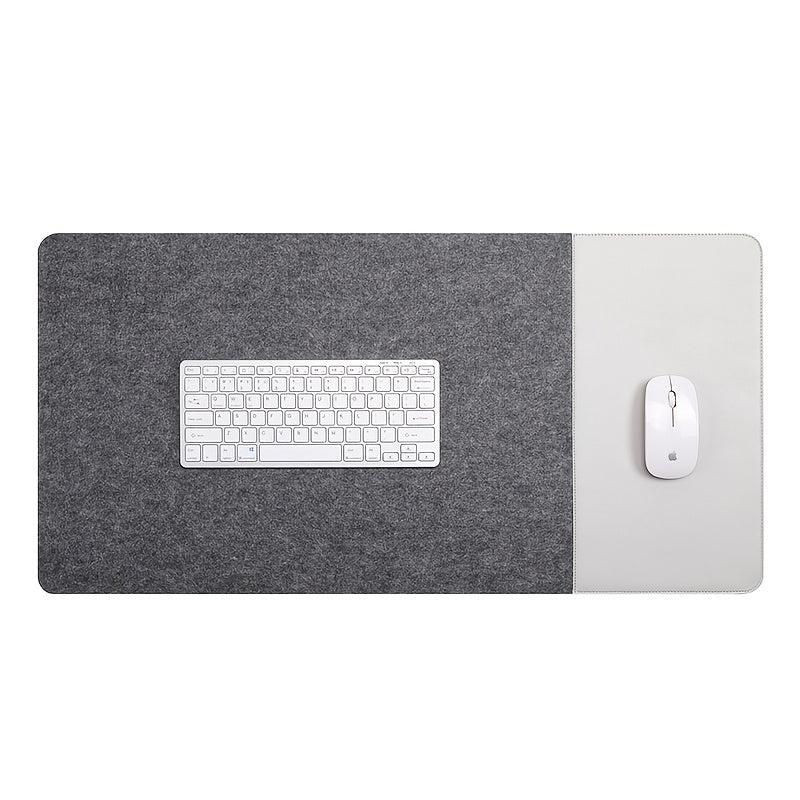 Large gaming mouse pad with anti-slip felt and faux leather, suitable for e-sports, writing, and office use. Includes wrist support and keyboard pad.