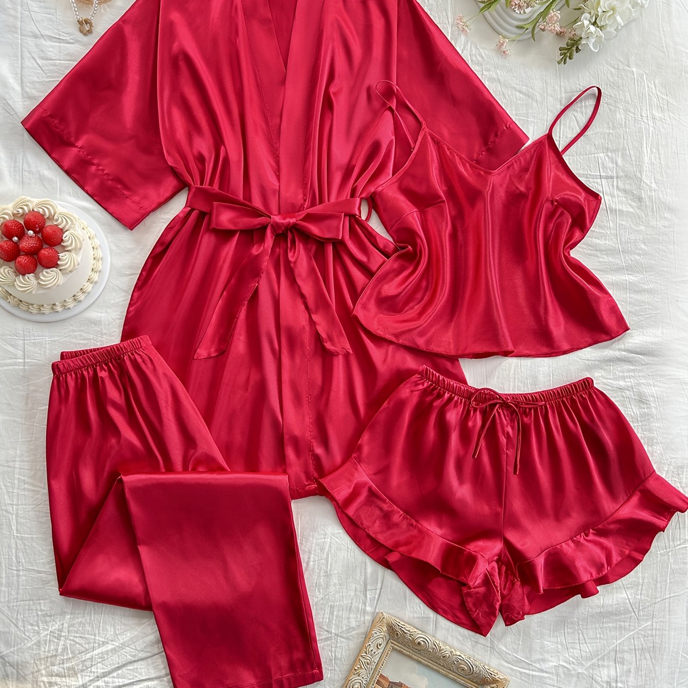 Satin 4-piece sleepwear set for women includes V-neck robe, top, shorts, and long pants in solid color. Made from 100% polyester, suitable for all seasons.