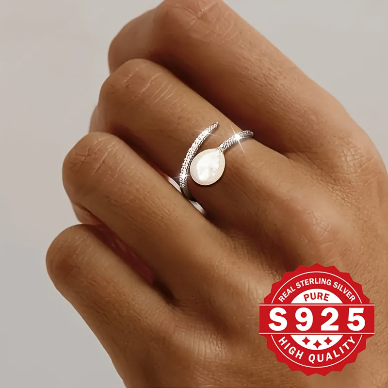 This elegant freshwater pearl ring for women is crafted from S925 sterling silver and adorned with artificial zirconia and freshwater pearls. Its stylish clash design makes it a unique gift option for festivals. Suitable for all occasions, this