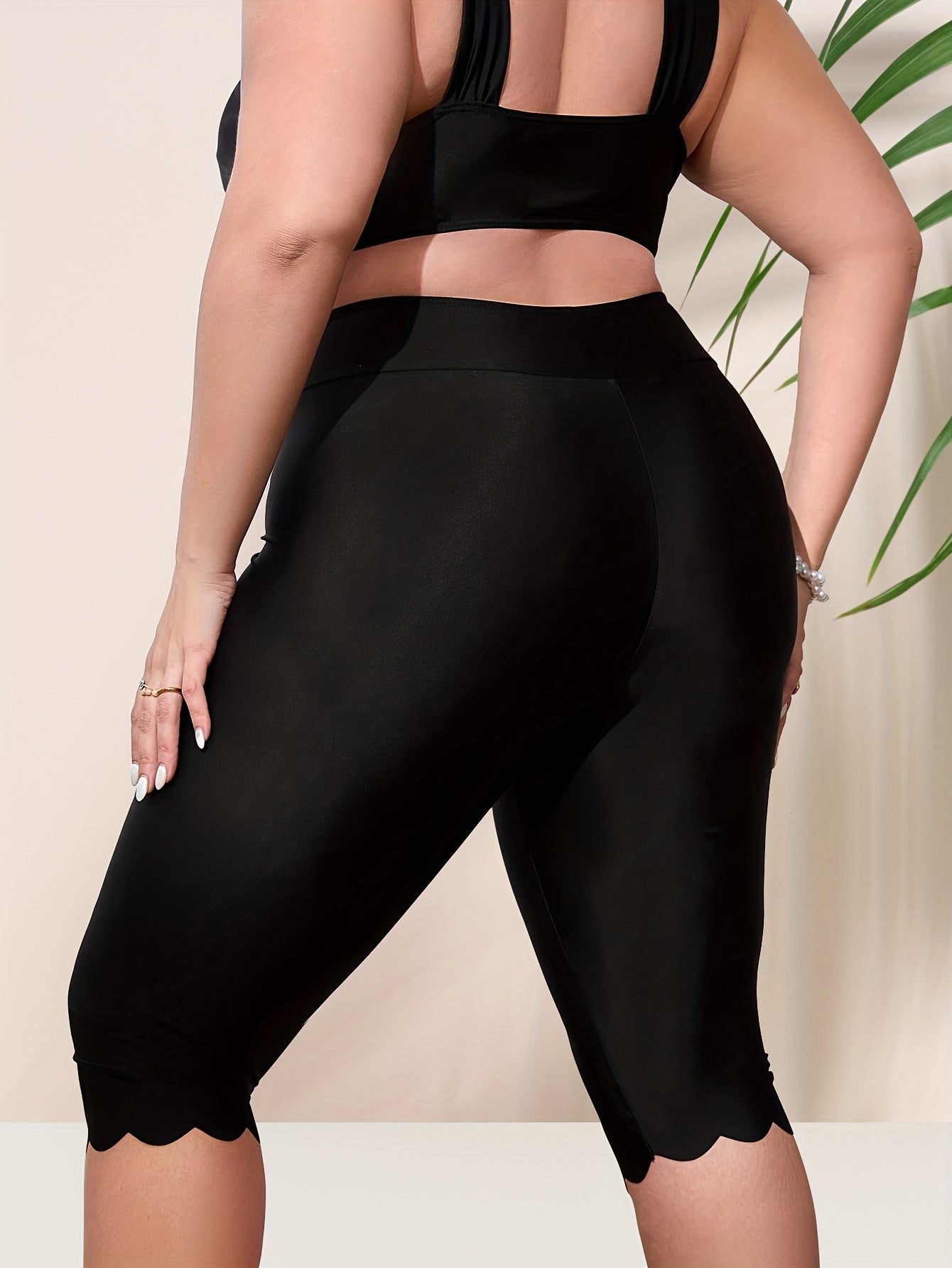 Plus size high waist swim capris pants with scallop trim for women's water sports.