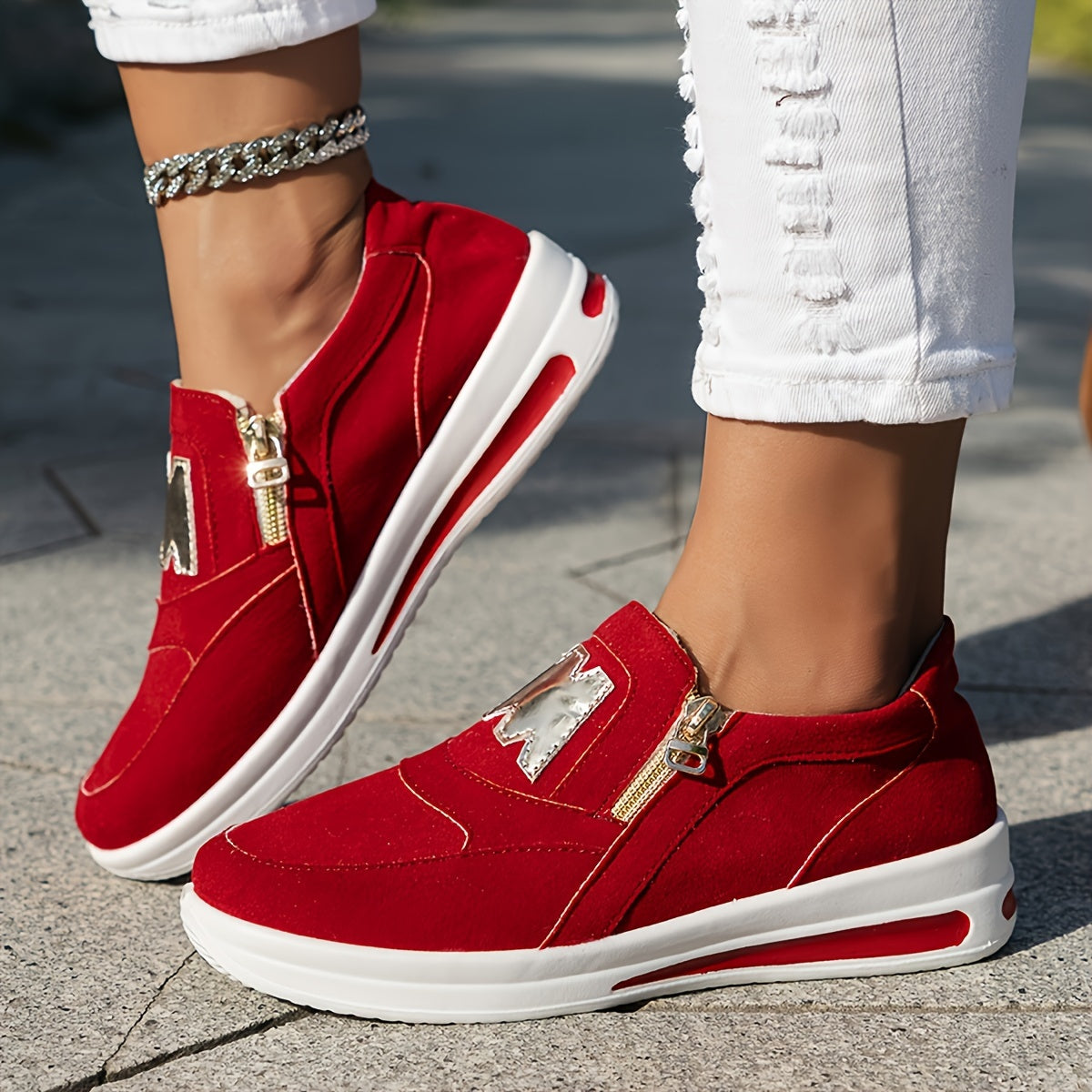 Red slip-on sneakers for women with zipper, low top style, lightweight, PU cover sole, white and golden accents.