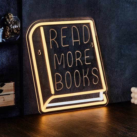 Neon "READ MORE BOOKS" sign for book lovers, perfect for home or office décor. Ideal for girls' bedroom and study area. USB-powered and wall-mounted.