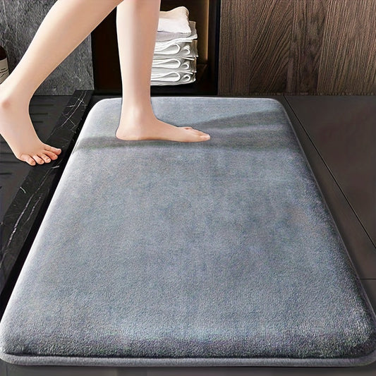 Soft and durable polyester bathroom mat with geometric design, ideal for shower, bathtub, bedroom, and living room. Versatile and non-slip, it is highly absorbent and machine washable.