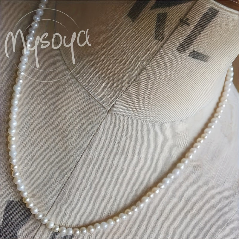 Elegant freshwater pearl necklace crafted by hand, featuring natural 6-7mm white pearls - the June birthstone. This luxurious piece is free of any plating and is perfect for both weddings and everyday wear. An ideal Valentine's gift, it comes with a