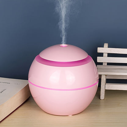 Quiet USB-powered cold mist humidifier and essential oil diffuser, ideal for bedroom, office, living room, and travel during winter and autumn. Portable and easy to clean.