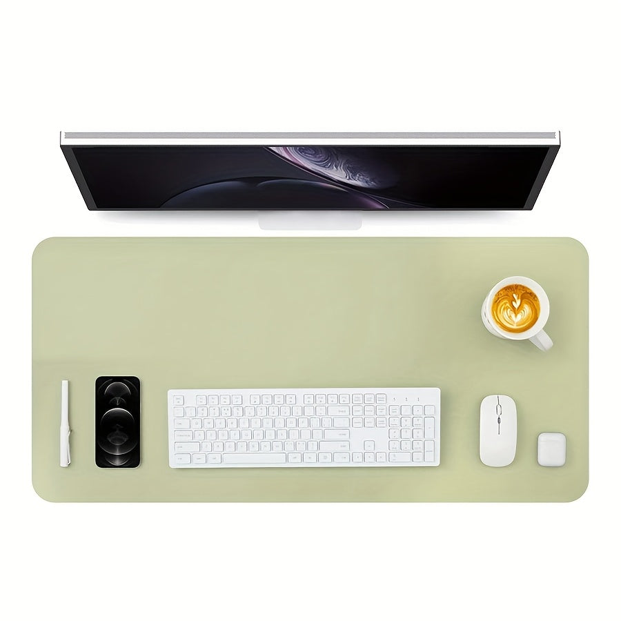 Waterproof faux leather desk pad with anti-slip surface for office and home use. Measures 59.99 x 32.99 cm. Rectangular mouse pad for workspace protection. Sleek and easy to clean design.