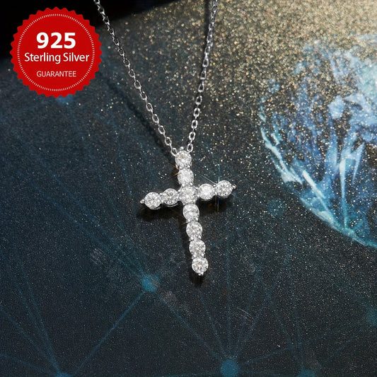 An exquisite Mozambique Diamond Cross Pendant Necklace, featuring a dazzling 1.1 carat diamond and 0.1ct * 11 Mozambique stones. Crafted from high-quality S925 Sterling Silver, this necklace weighs about 1.1 grams, making it a luxurious piece of jewelry