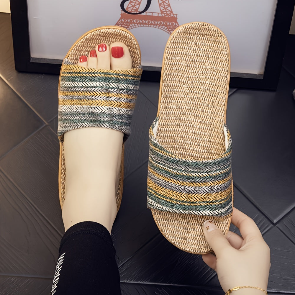 Comfortable home slippers with a striped pattern and casual open toe design.