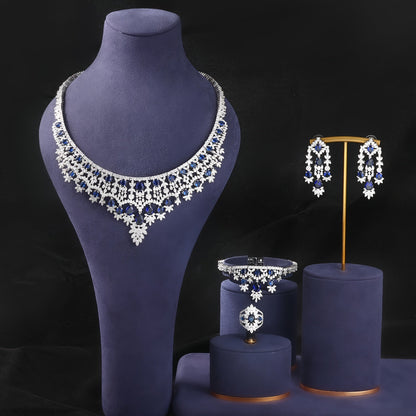 Elegant and fashionable women's jewelry set perfect for brides, weddings, banquets, and all-year wear. This luxury set includes a bracelet, necklace, ring, and earrings, ideal for a luxurious wedding or vacation look. Targeted for Ramadan and stylish