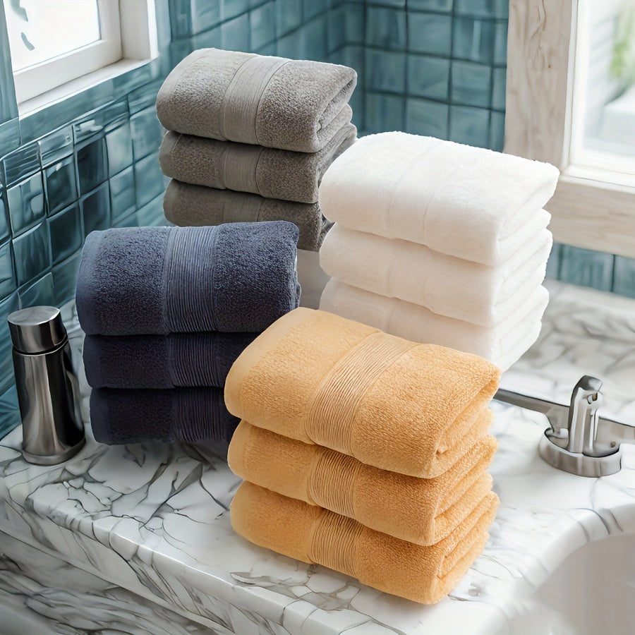 3 premium cotton velvet towels, 35.56cm x 73.66cm, soft & absorbent, hotel quality in dark blue, light beige, and gray. Ideal for bathroom or spa use.