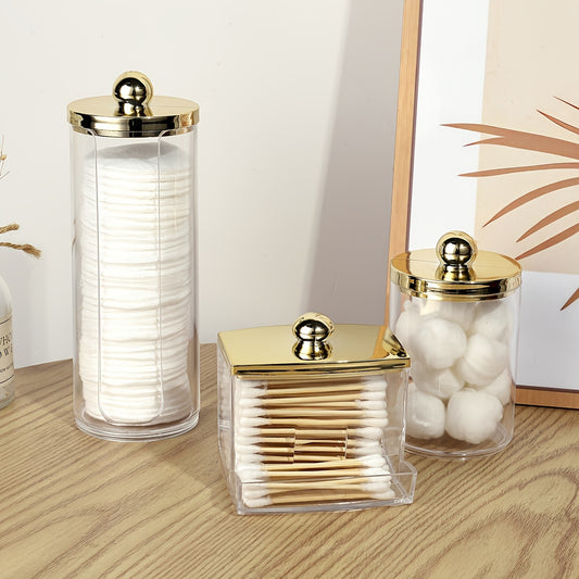 Bamboo-lidded cotton pad holder for bathroom organization.