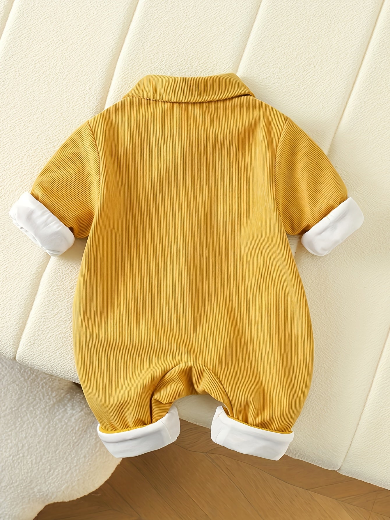 Mustard yellow bear patchwork romper with striped straps for baby boys is made of 100% polyester and has a casual style, perfect for spring/fall and outdoor activities.