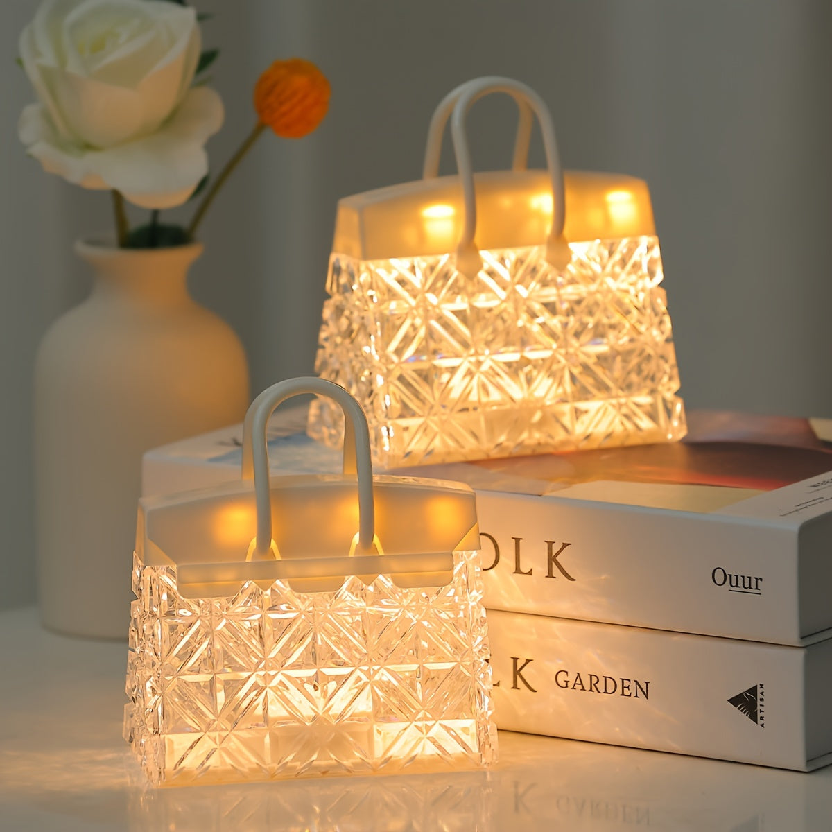 Chic Bag LED Night Light featuring a romantic petal design, ideal for bedroom ambiance and home decor. Battery-powered table light with 3D visual effect, great as a housewarming gift. By GMNEE.