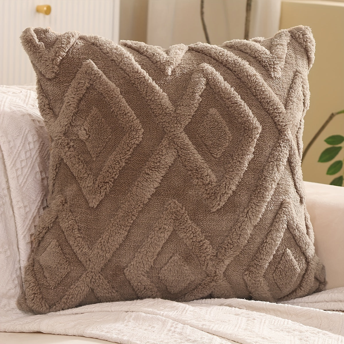 Pair of plush throw pillow covers in contemporary geometric pattern, hand wash only, 100% polyester zipper closure, beige wavy design for living room décor.