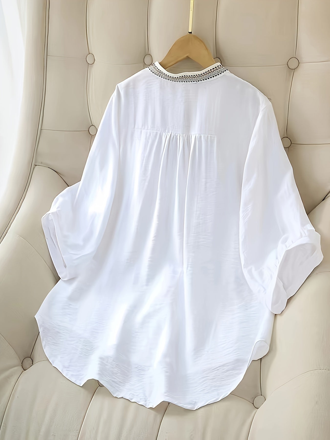 Embroidered short sleeve blouse with stand collar for women, made of breathable polyester, machine washable, semi-sheer.