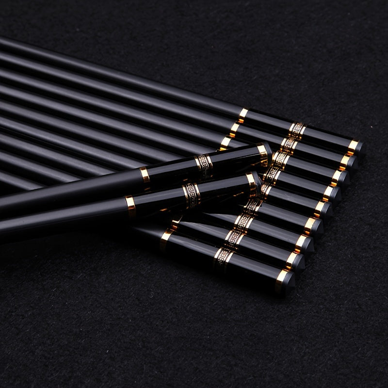 5 pairs of reusable alloy chopsticks with embossed Great Wall pattern, perfect for fast food, noodles, sushi, and ramen. Luxurious and stylish.