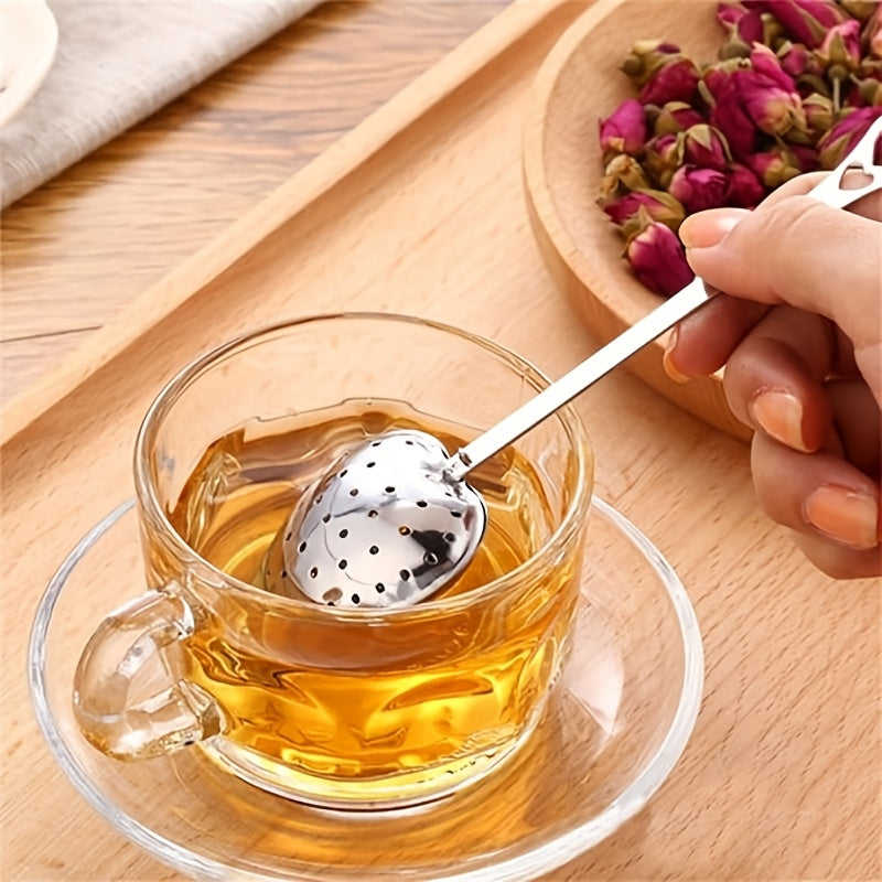 Heart-Shaped Tea Infuser made of Stainless Steel, featuring a Long Handle and Fine Mesh Strainer. Ideal for gifting during Christmas, Halloween, Thanksgiving, Valentine's Day, and Graduations.