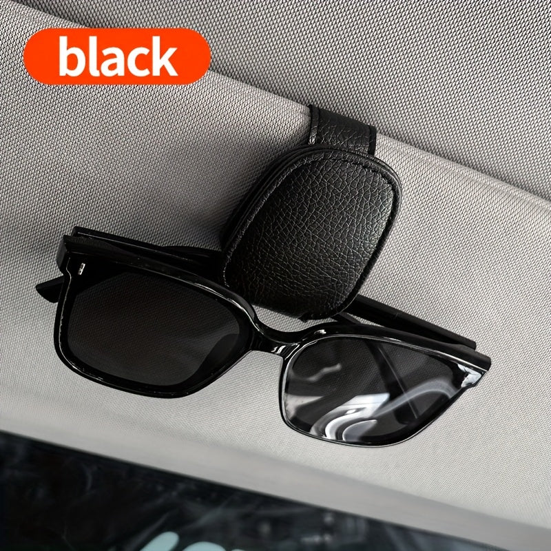 Universal car sun visor clip made of PVC material for storing eyeglasses in the vehicle interior.