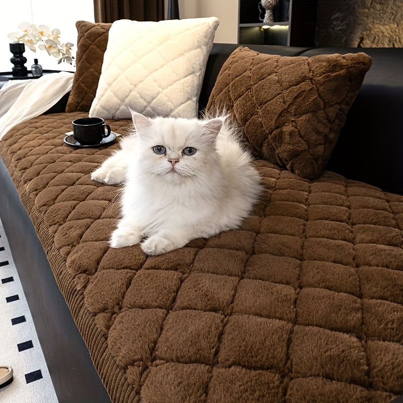 Modern quilted sofa cover, pet-friendly, machine washable, non-slip, thick polyester protector for various furniture sizes and styles in home or office décor.