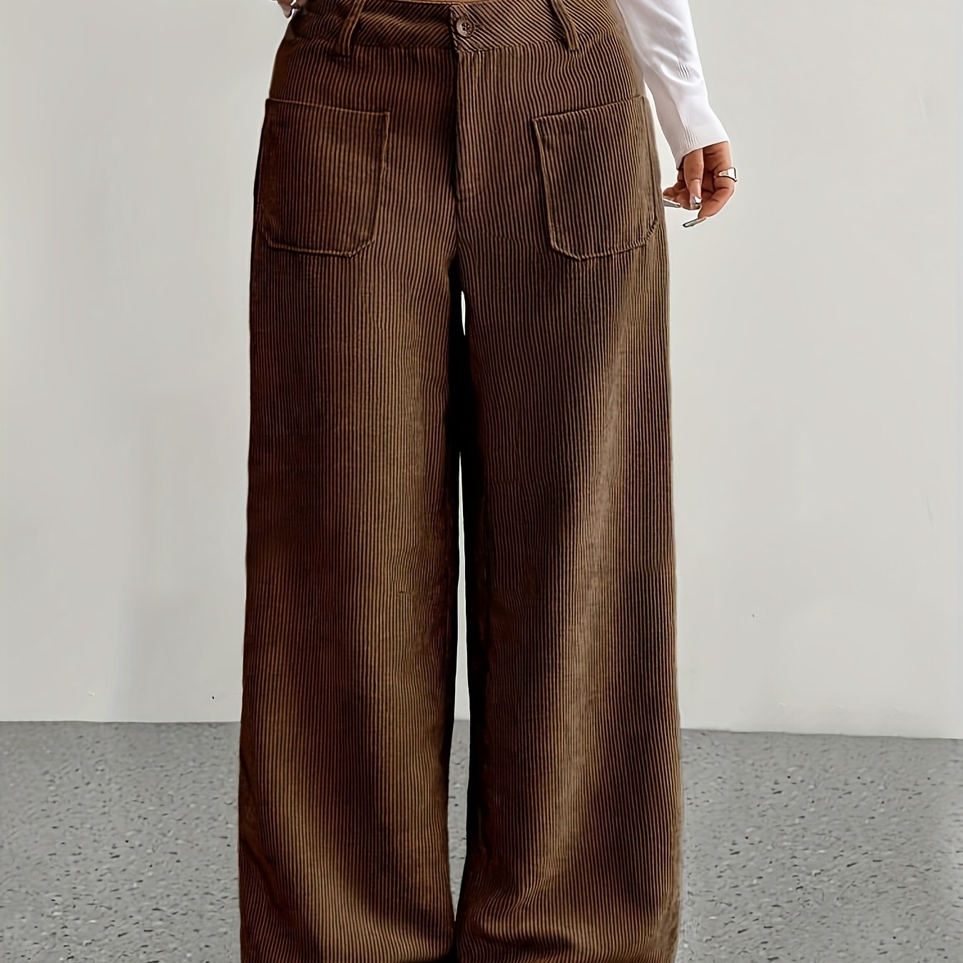 Casual corduroy wide leg pants for women made of polyester, suitable for all seasons.