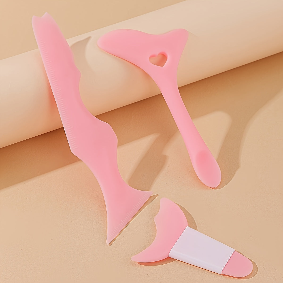 Set of 3 silicone makeup guides in pink for perfect eyeliner, eyelashes, and brows, suitable for all skin types, fragrance-free.