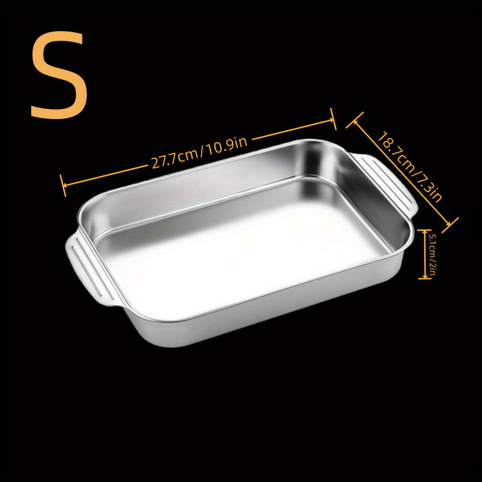 One piece of stainless steel deep baking sheet for non-stick cooking, grilling, and baking in the oven, with a selection of kitchen gadgets and accessories.