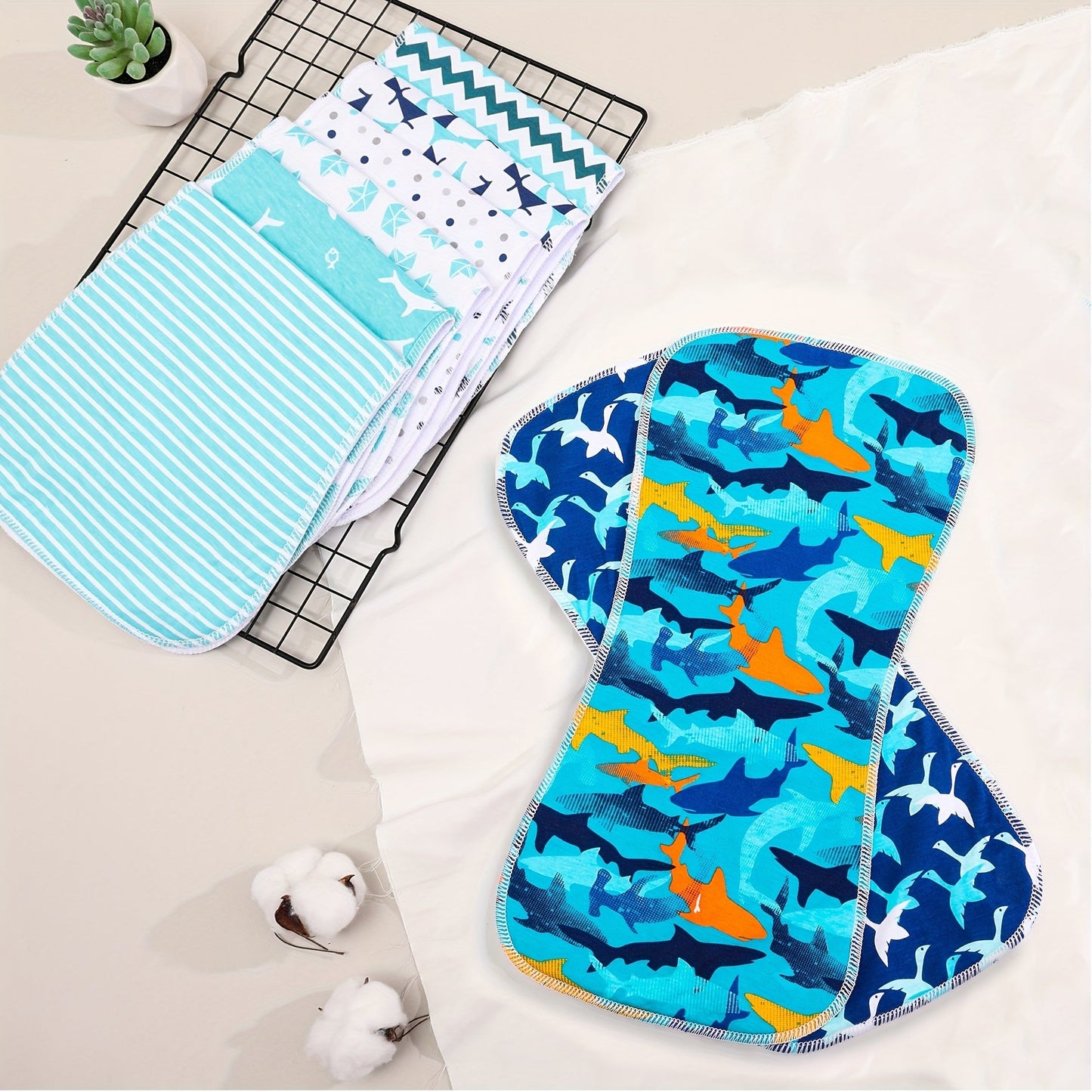 Set of 3 cotton burp cloths for baby boys, designed for extra absorbency and softness. Perfect for newborns, these large-sized cloths are great for catching spit up and keeping baby clean.