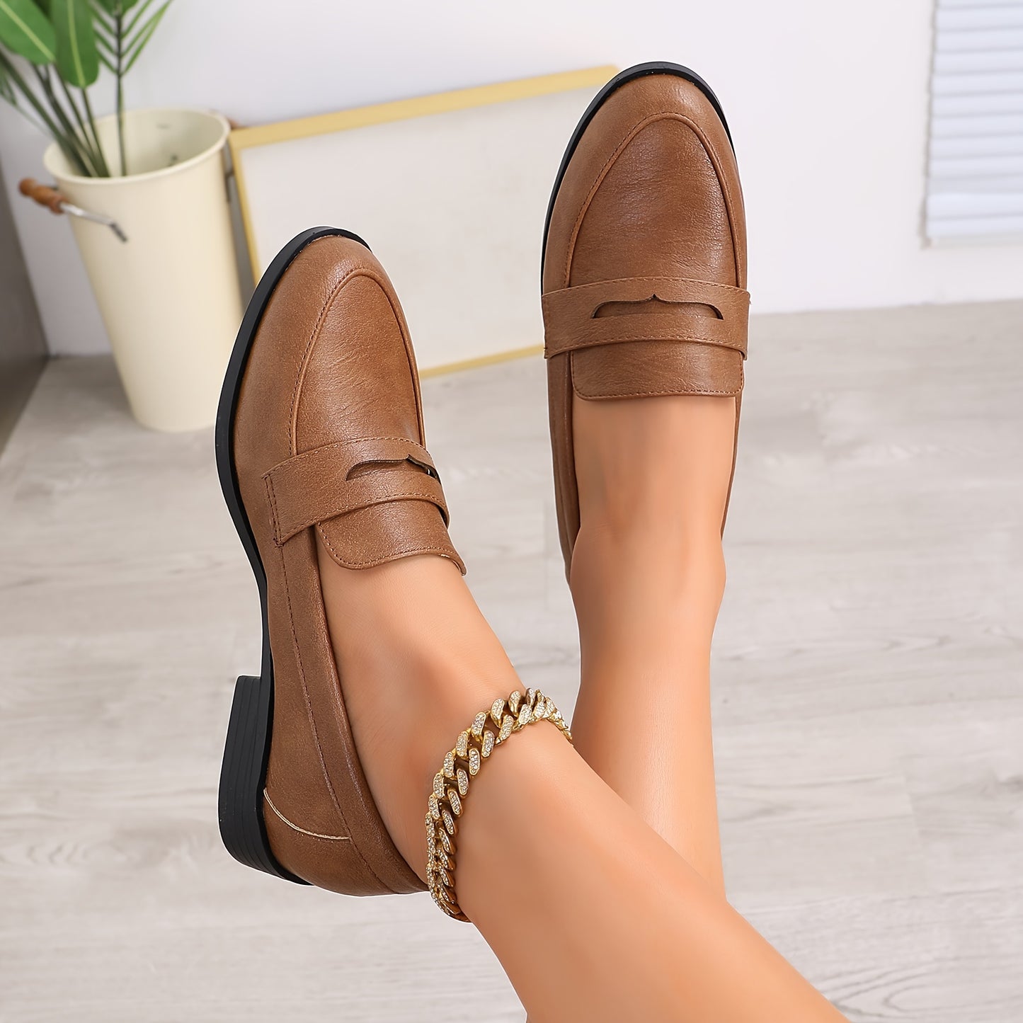 Chic brown slip-on loafers for women feature a comfortable round toe, flat heel, and faux leather driving shoes with a TPR sole for easy care and all-season wear.