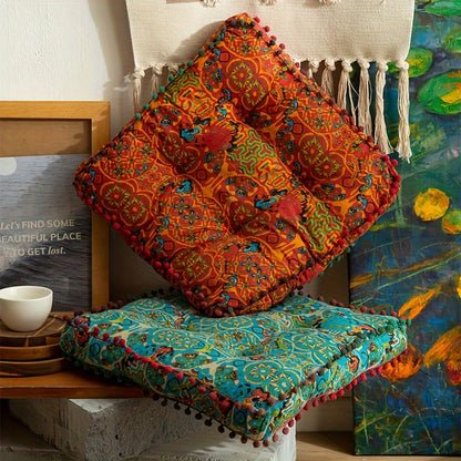 Boho-chic square cushion with pompoms: Versatile and fade-resistant.