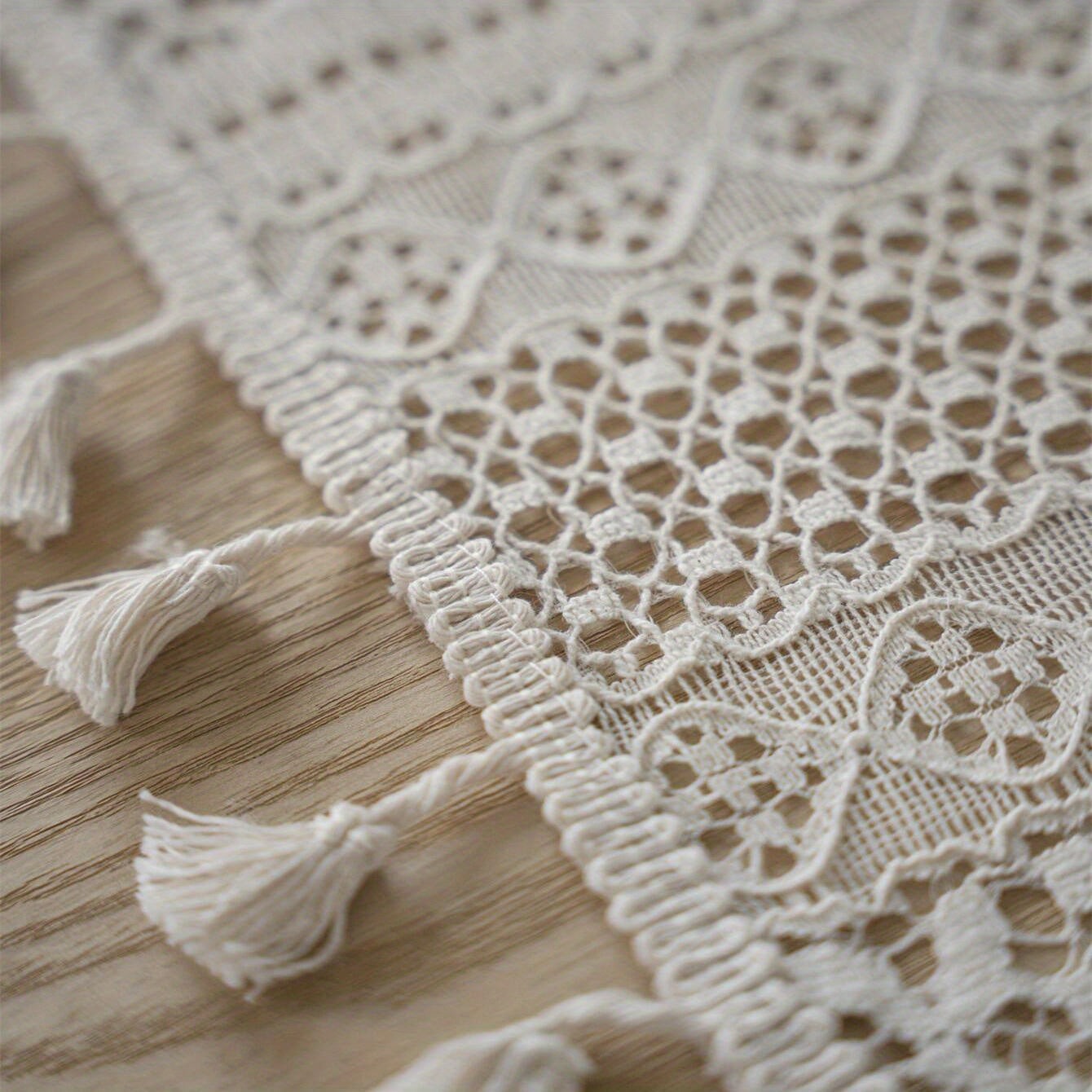 Bohemian chic crochet lace tablecloth, ideal for dining and parties. Rectangular polyester design with a farmhouse style, perfect for boho home decor. Great for buffet tables, banquets, and serving western food.