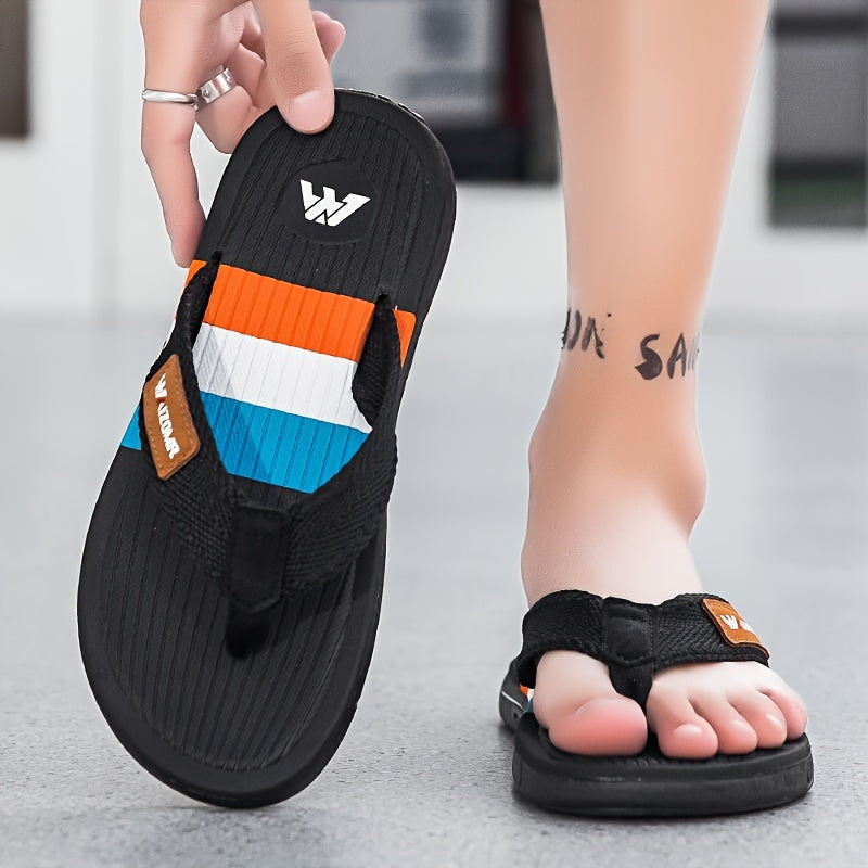 Stylish men's color block flip flops with non-slip rubber sole for indoor activities.