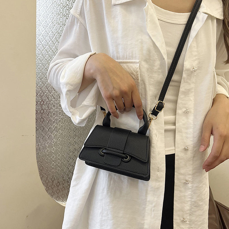 Women's chic mini crossbody bag, small square design in a solid color with magnet closure and adjustable shoulder strap, perfect for daily use and commuting.