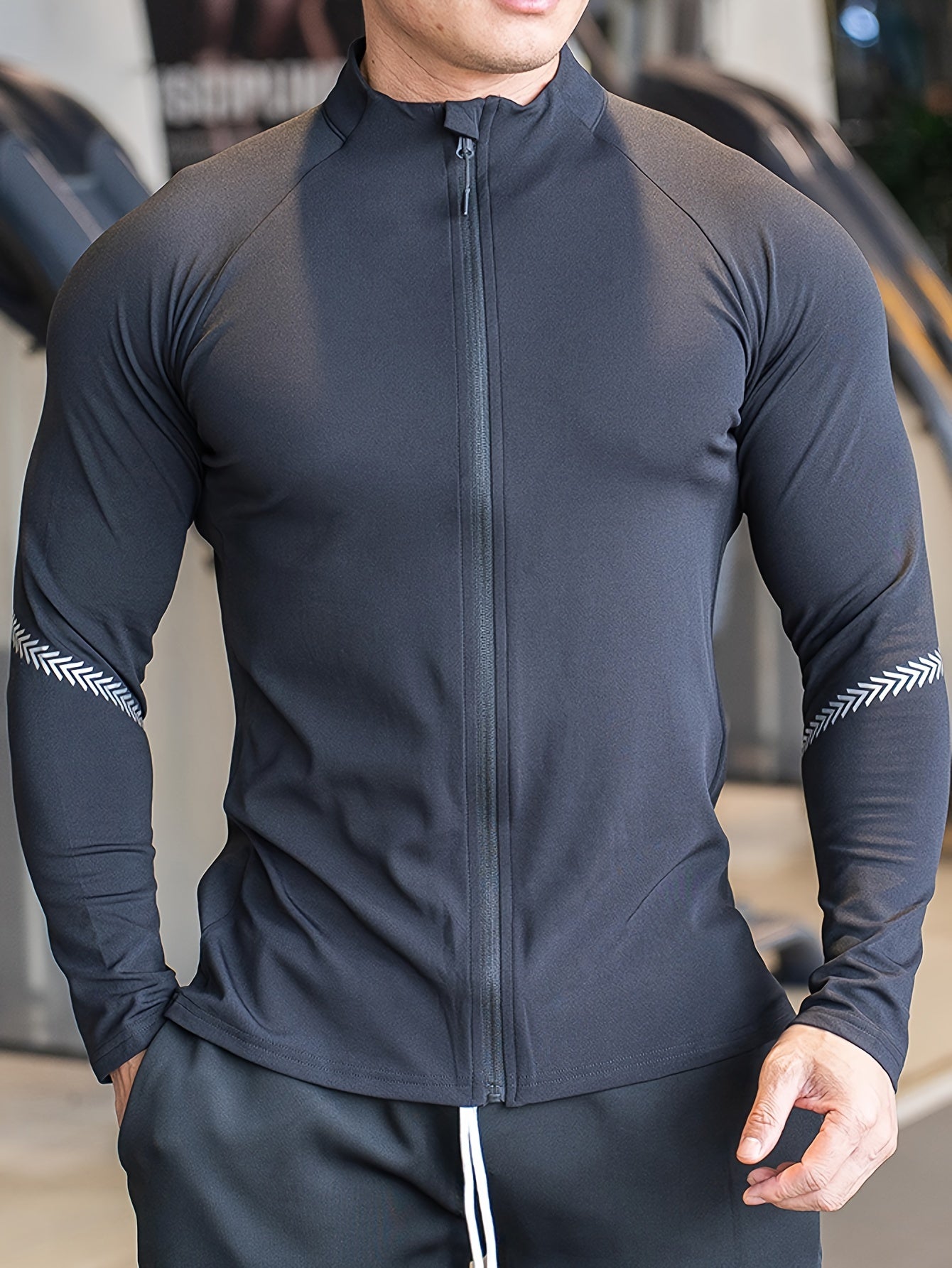 Men's quick-dry, lightweight jacket with stand collar and zip closure. Ideal for sun protection during basketball, cycling, hiking, and outdoor activities.