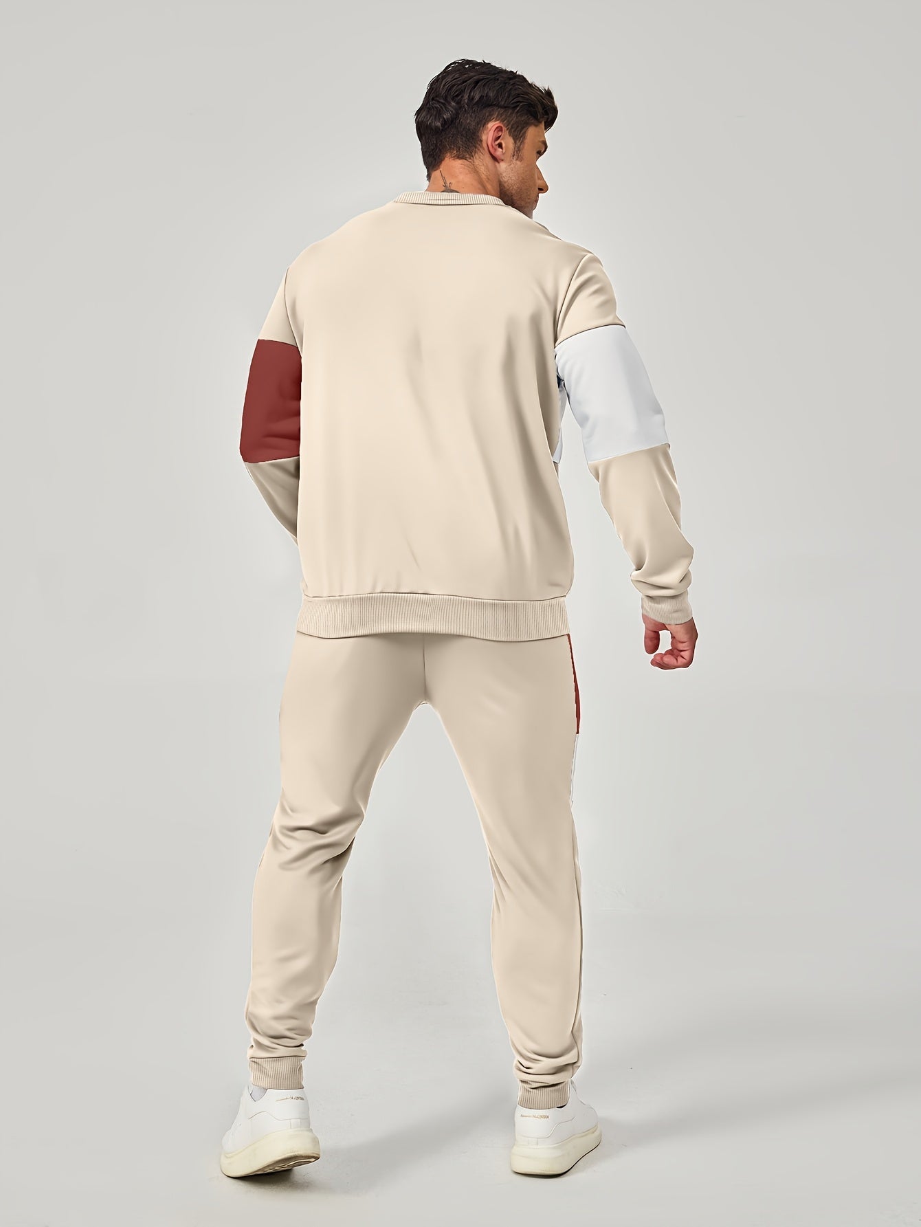 Men's casual crew neck sweatshirt and joggers set. Color block design in polyester blend, machine washable. Ideal for spring and fall, leisure style.