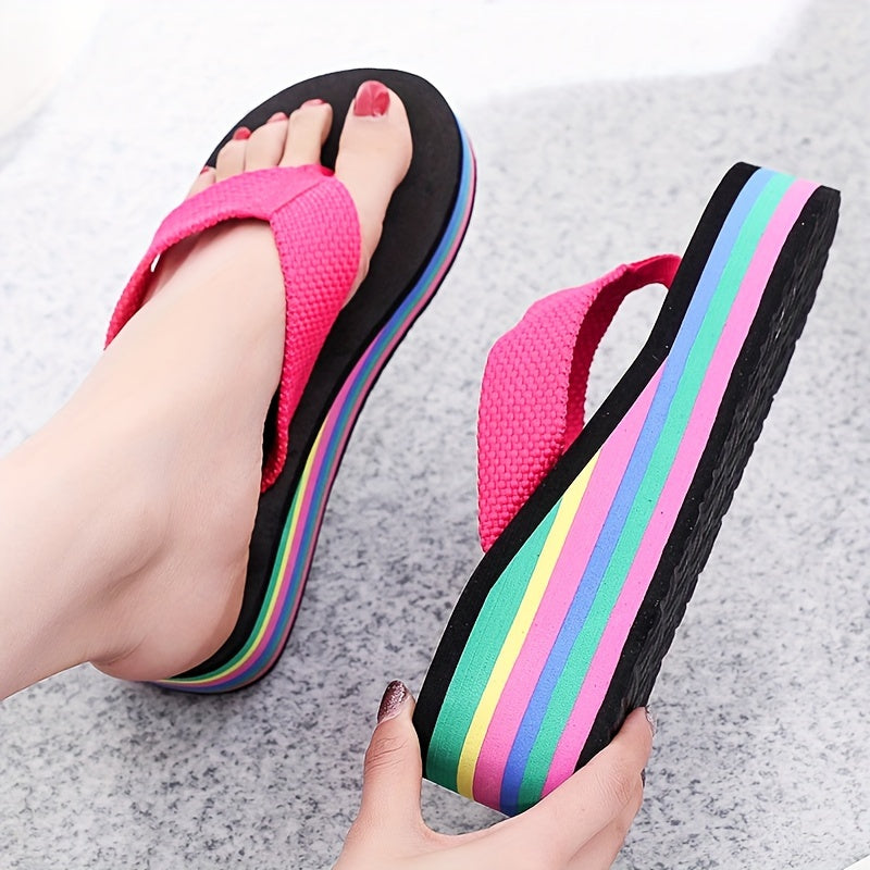 Summer clog flip flops with high heels and rainbow sole for seaside vacation.